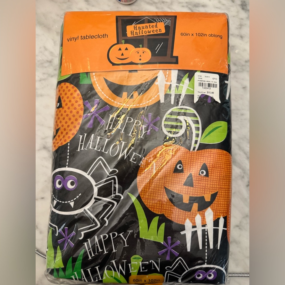 Oblong haunted Halloween vinyl tablecloth